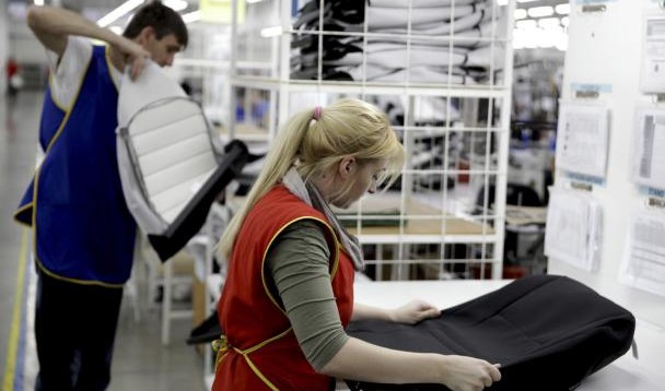 Workers prepare car upholstery in the Prevent factory in Gorazde